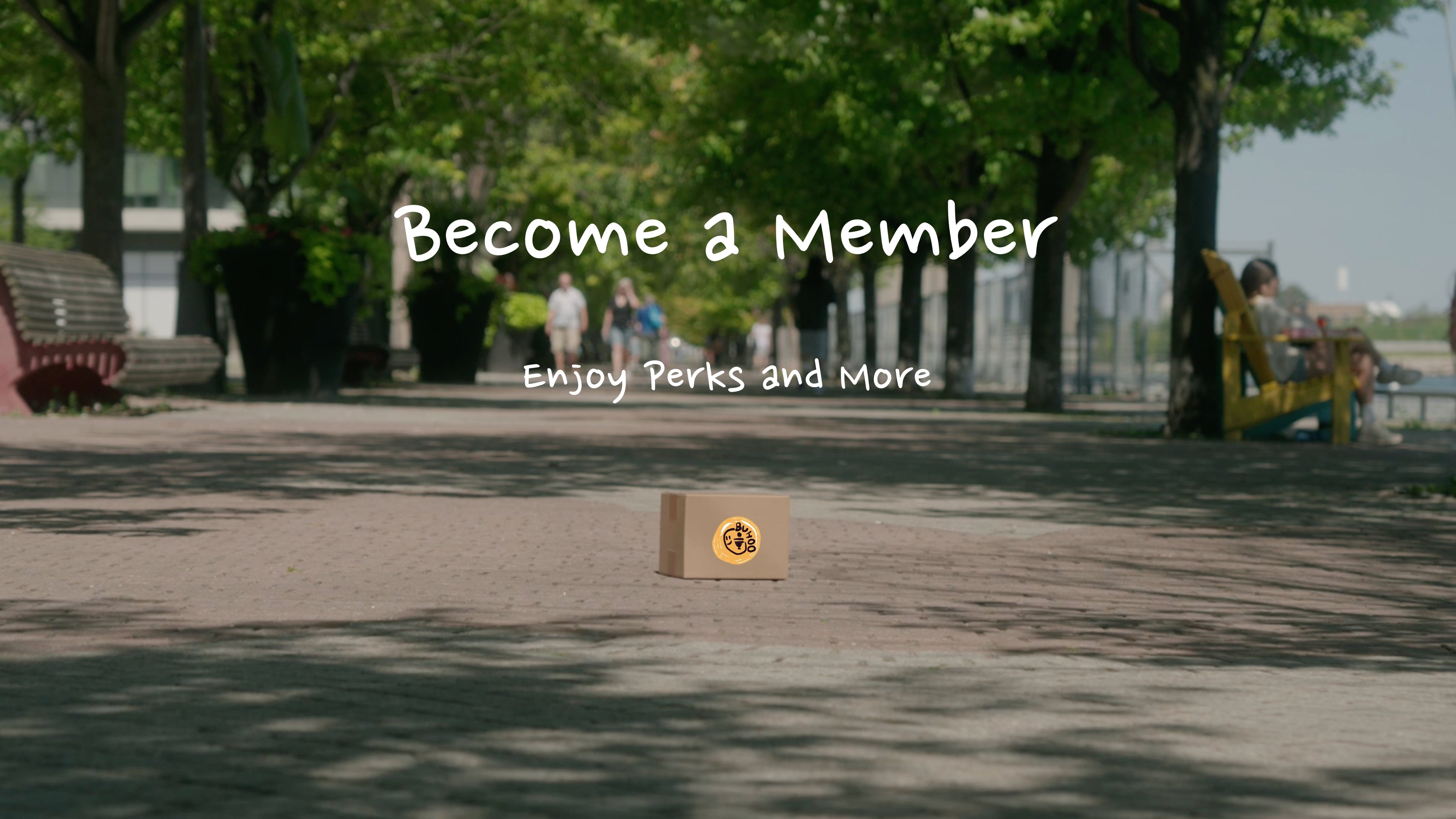 Wooden box with a membership card on a park path, text overlay 'Become a Member, Enjoy Perks and More'.